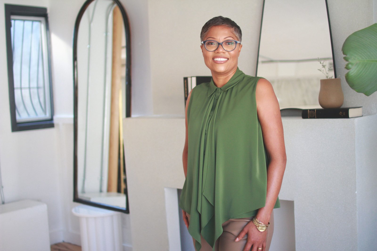 Dr. Joan Samuels-Dennis smiling in a moment of strength and presence