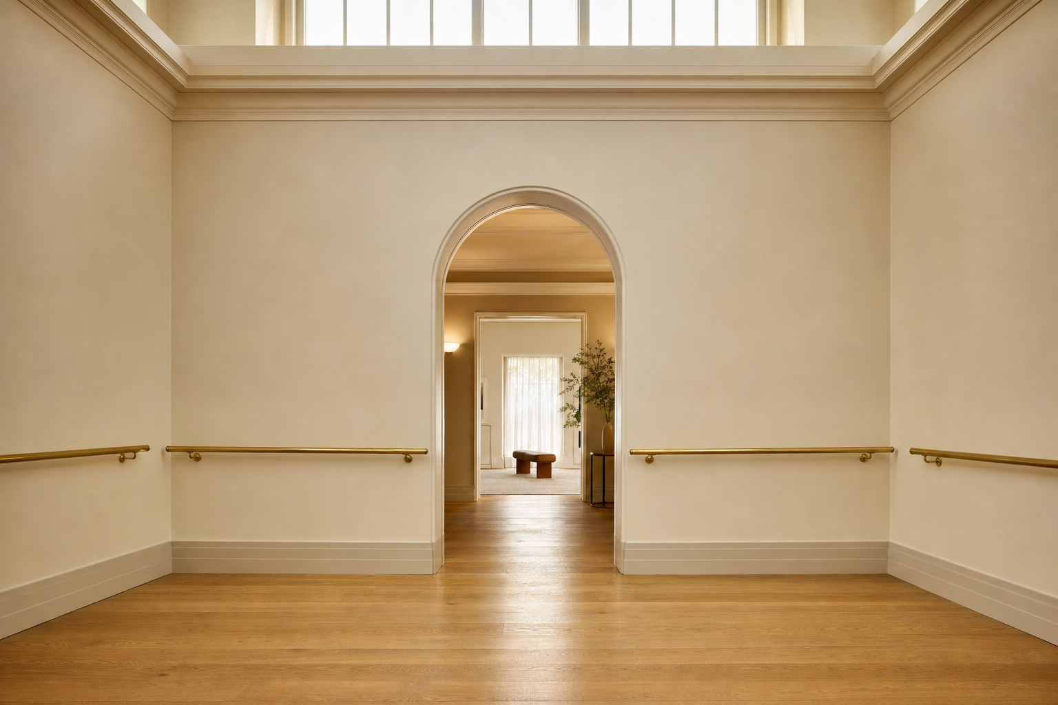 A wide accessible threshold &mdash; open doorway with soft natural light, no barriers.
